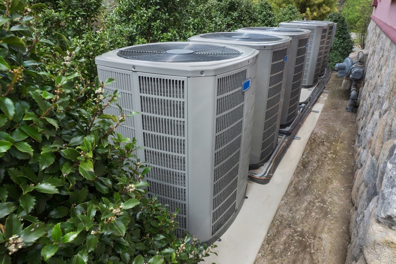 Air Conditioning Basics––Did You Know? AC units outside a building.