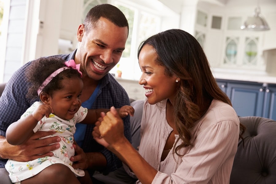Happy young family in a comfortable home in Keizer|OR.