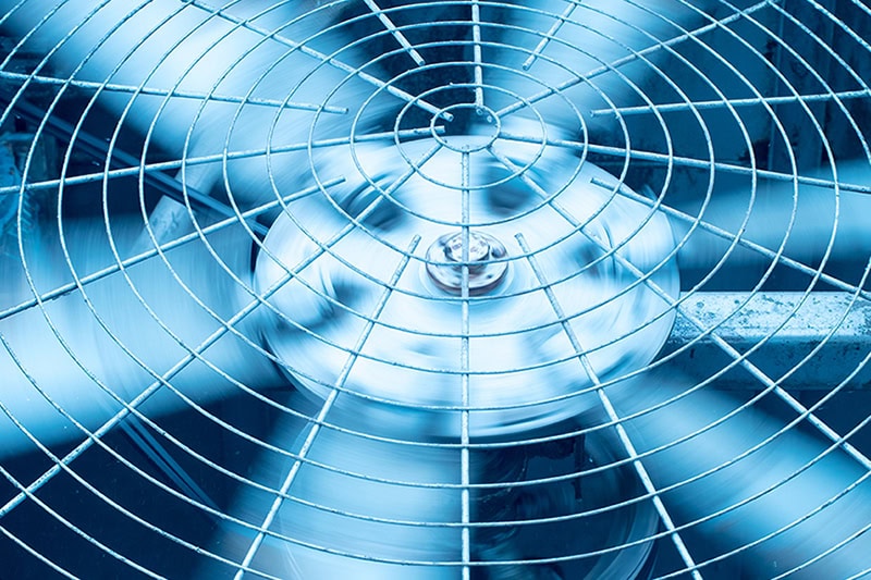 3 Tips to Getting the Most From Your HVAC Warranty. Close up photo of an HVAC unit.